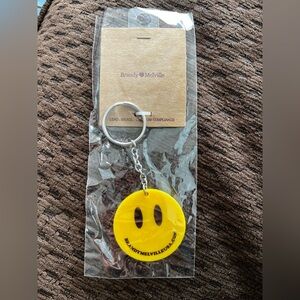 Brandy Melville Bright Yellow Smiley Keychain